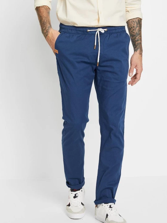 Obrázek produktu Spodnie z gumką w talii, ze stretchem, slim fit, prosta nogawka BonPrix niebieski