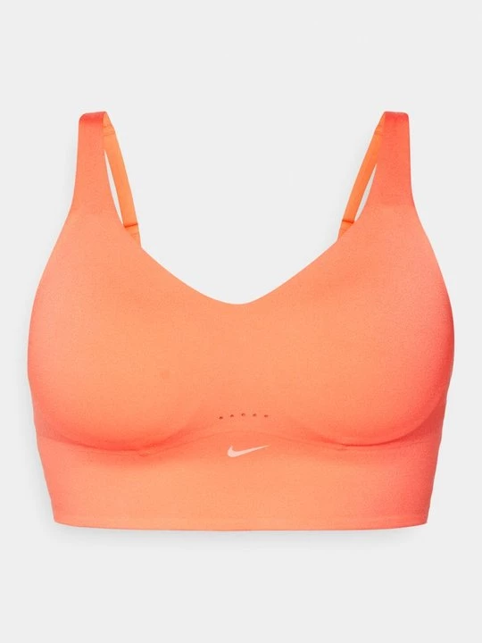 Obrázek produktu Sportovní podprsenky se střední oporou Nike korálová