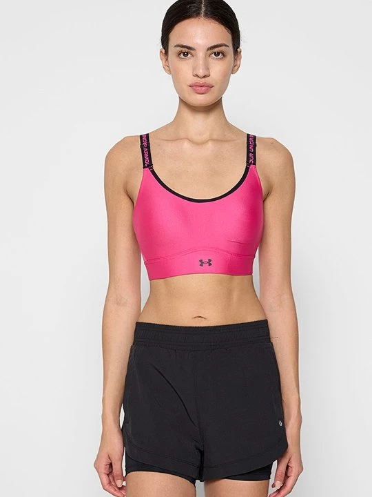 Obrázek produktu Sportovní podprsenky se střední oporou Under Armour růžová