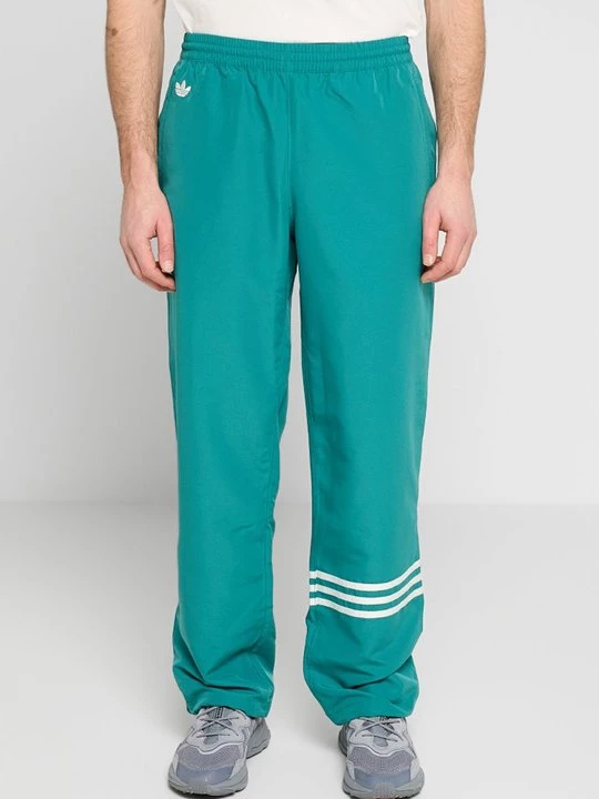 Obrázek produktu Teplákové kalhoty adidas Originals zelená