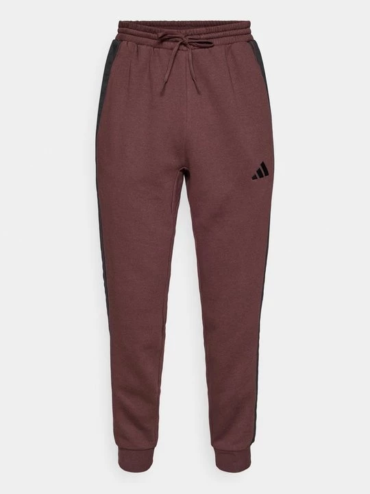 Obrázek produktu Teplákové kalhoty Adidas světle hnědá