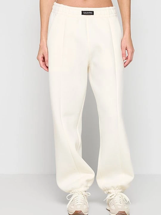 Obrázek produktu Teplákové kalhoty Calvin Klein světle žlutá