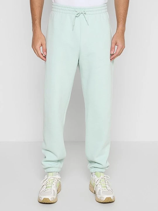 Obrázek produktu Teplákové kalhoty New Balance světle zelená