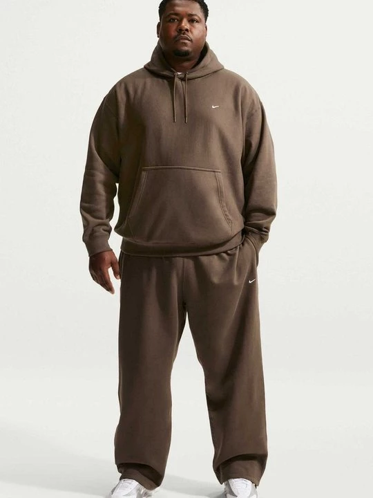 Obrázek produktu Teplákové kalhoty Nike tmavě hnědá
