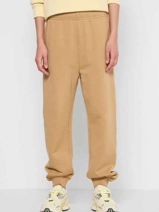 Obrázek produktu Teplákové kalhoty Tommy Hilfiger okrová
