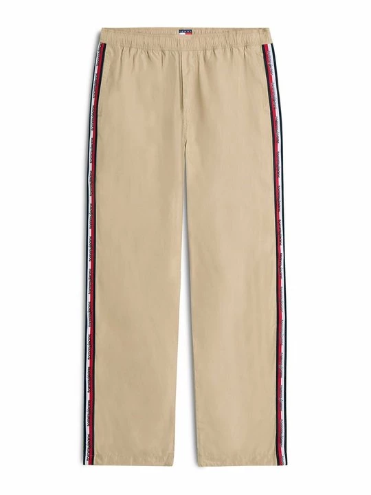 Obrázek produktu Teplákové kalhoty Tommy Jeans zlatá barva