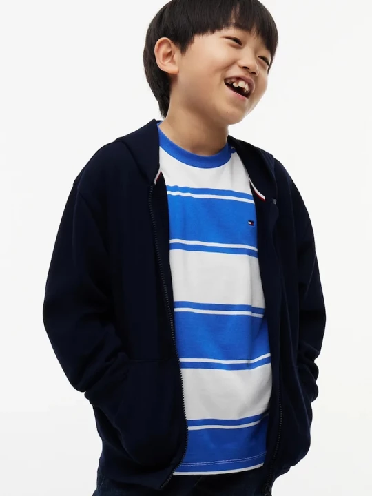 Obrázek produktu Tommy Hilfiger rozepínací mikina s kapucí dětská bavlněná námořnická modř