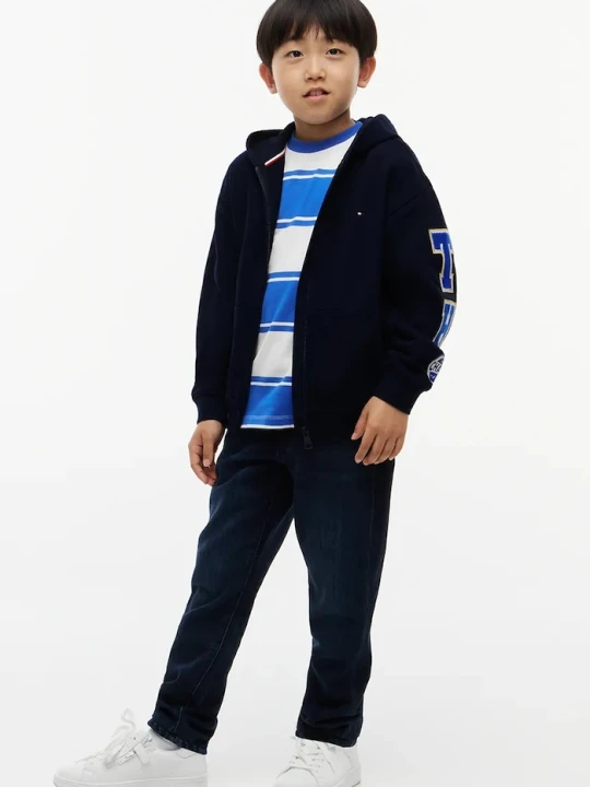 Obrázek produktu Tommy Hilfiger rozepínací mikina s kapucí dětská bavlněná námořnická modř