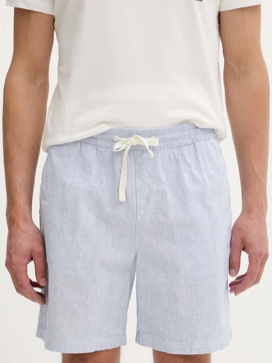 Obrázek produktu Tommy Jeans chino šortky pánské bavlněné elastanem modrá