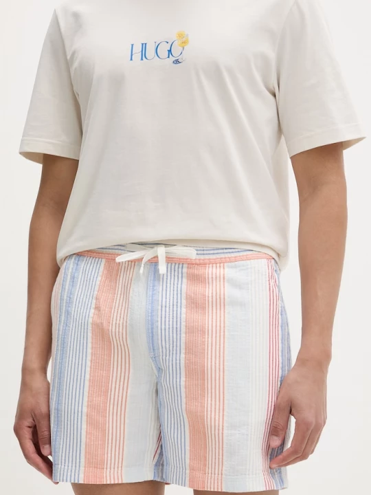Obrázek produktu Tommy Jeans šortky pánské bavlněné oranžová