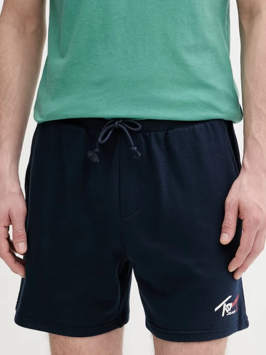 Obrázek produktu Tommy Jeans teplákové šortky pánské bavlněné námořnická modř