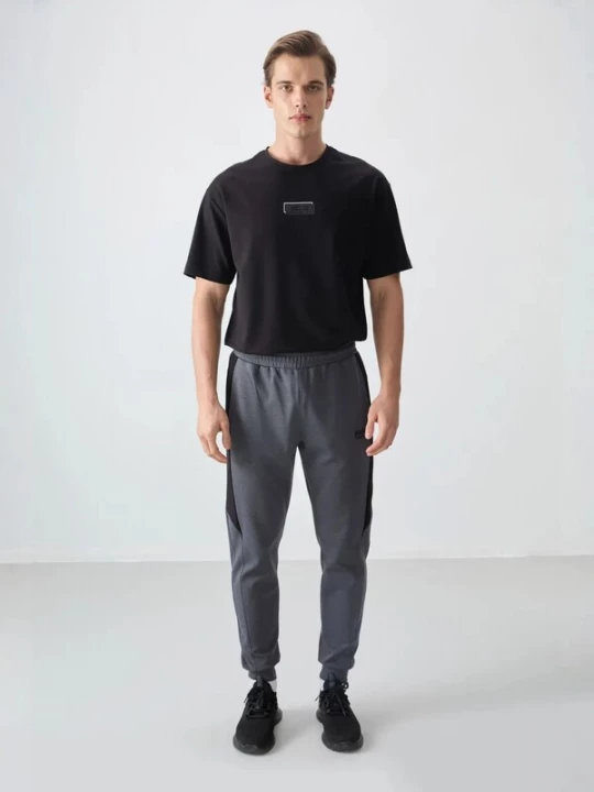 Obrázek produktu Tommy Life Sportovní kalhoty 'Jogginghose' tmavě šedá