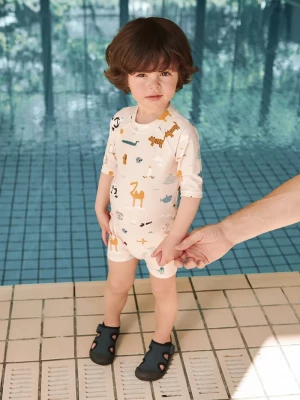 Obrázek produktu Liewood plážový overal dětský Thor Baby Swim Jumpsuit béžová