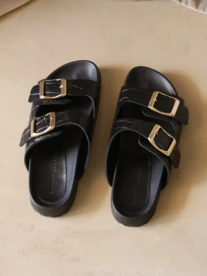 Obrázek produktu Manebi Kožené pantofle Manebi Traveler Nordic Sandals černá