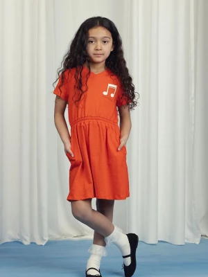 Obrázek produktu Mini Rodini Dětské bavlněné šaty Mini Rodini Note oranžová