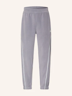 Obrázek produktu New Balance Fleecové Kalhoty mb62 světle fialová / bílá