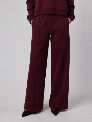 Obrázek produktu OWN Off With Nature Kalhoty 'Pantalone Palazzo con Risvolto in Interlock Burgundy' bordó