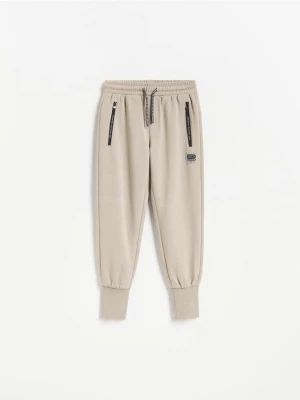 Obrázek produktu Reserved - Bavlněné jogger kalhoty - béžová
