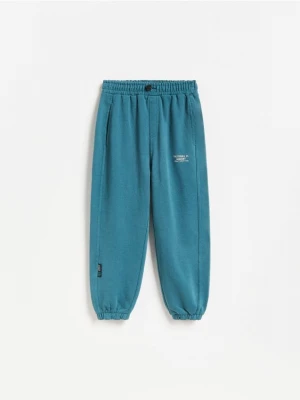 Obrázek produktu Reserved - Bavlněné kalhoty joggers - tmavě tyrkysová