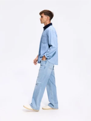 Obrázek produktu Reserved - Džíny bootcut s opraným efektem - modrá