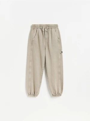 Obrázek produktu Reserved - Joggery baggy s efektem seprání - béžová