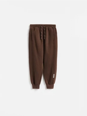 Obrázek produktu Reserved - Zateplené baggy joggery - tmavě hnědá