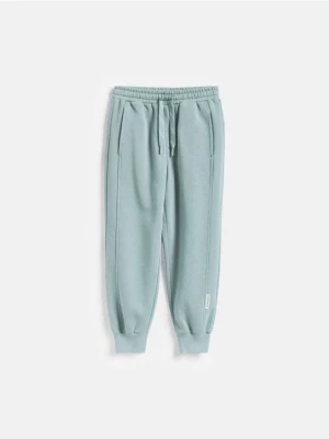 Obrázek produktu Reserved - Zateplené baggy joggery - tyrkysová