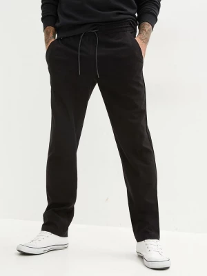 Obrázek produktu Spodnie z gumką w talii, ze stretchem, krój relaxed fit, straight BonPrix czarny