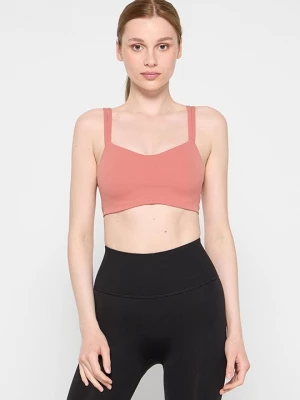 Obrázek produktu Sportovní podprsenky s lehkou oporou Nike korálová