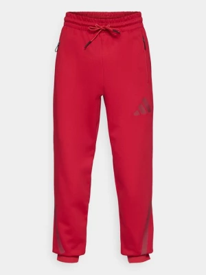 Obrázek produktu Teplákové kalhoty Adidas bordó
