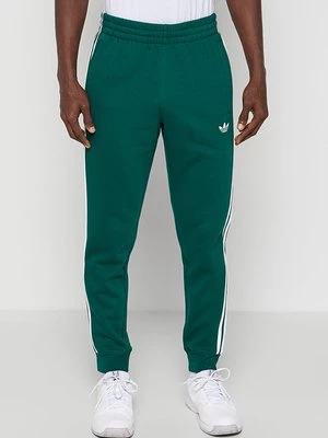 Obrázek produktu Teplákové kalhoty adidas Originals zelená