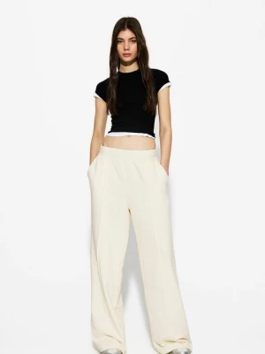 Obrázek produktu Teplákové kalhoty Bershka béžová