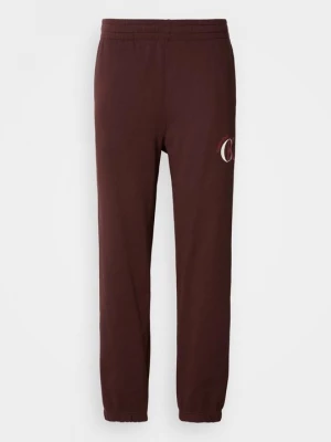 Obrázek produktu Teplákové kalhoty Calvin Klein Jeans tmavě hnědá