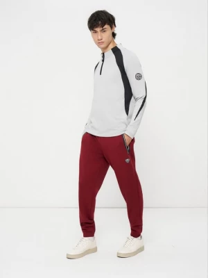 Obrázek produktu Teplákové kalhoty EA7 Emporio Armani tmavě červená