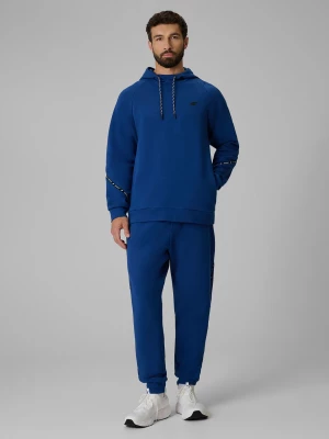 Obrázek produktu Teplákové kalhoty joggery pánské - tmavě modré 4F