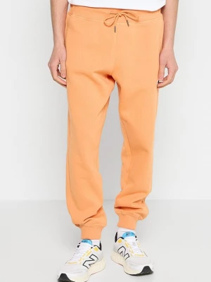 Obrázek produktu Teplákové kalhoty New Balance oranžová