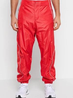 Obrázek produktu Teplákové kalhoty Nike červená