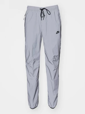 Obrázek produktu Teplákové kalhoty Nike stříbrná