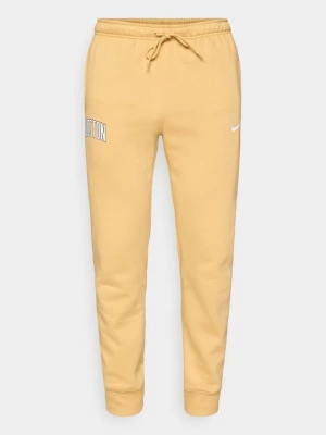 Obrázek produktu Teplákové kalhoty Nike zlatá barva