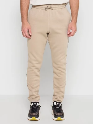 Obrázek produktu Teplákové kalhoty Under Armour hnědá