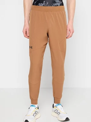 Obrázek produktu Teplákové kalhoty Under Armour okrová