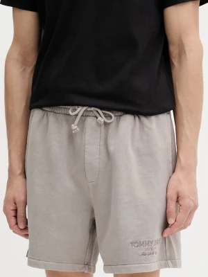 Obrázek produktu Tommy Jeans teplákové šortky pánské bavlněné hnědá