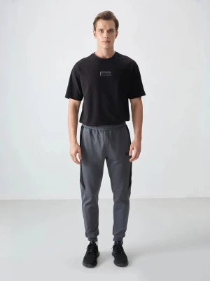Obrázek produktu Tommy Life Sportovní kalhoty 'Jogginghose' tmavě šedá