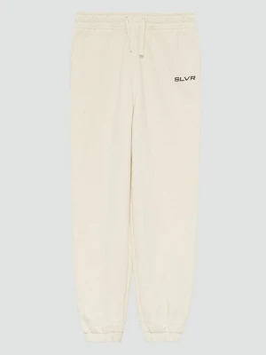 Obrázek produktu Unisex joggingové kalhoty z teplákoviny s natištěným detailem s.Oliver béžová